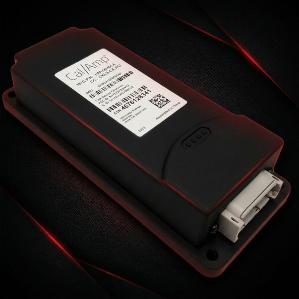 HMU-3640 — black rectangular CalAmp telematics device with mounting holes, multi-pin connector, and product label, photographed at an angle on a dark red-accented background.